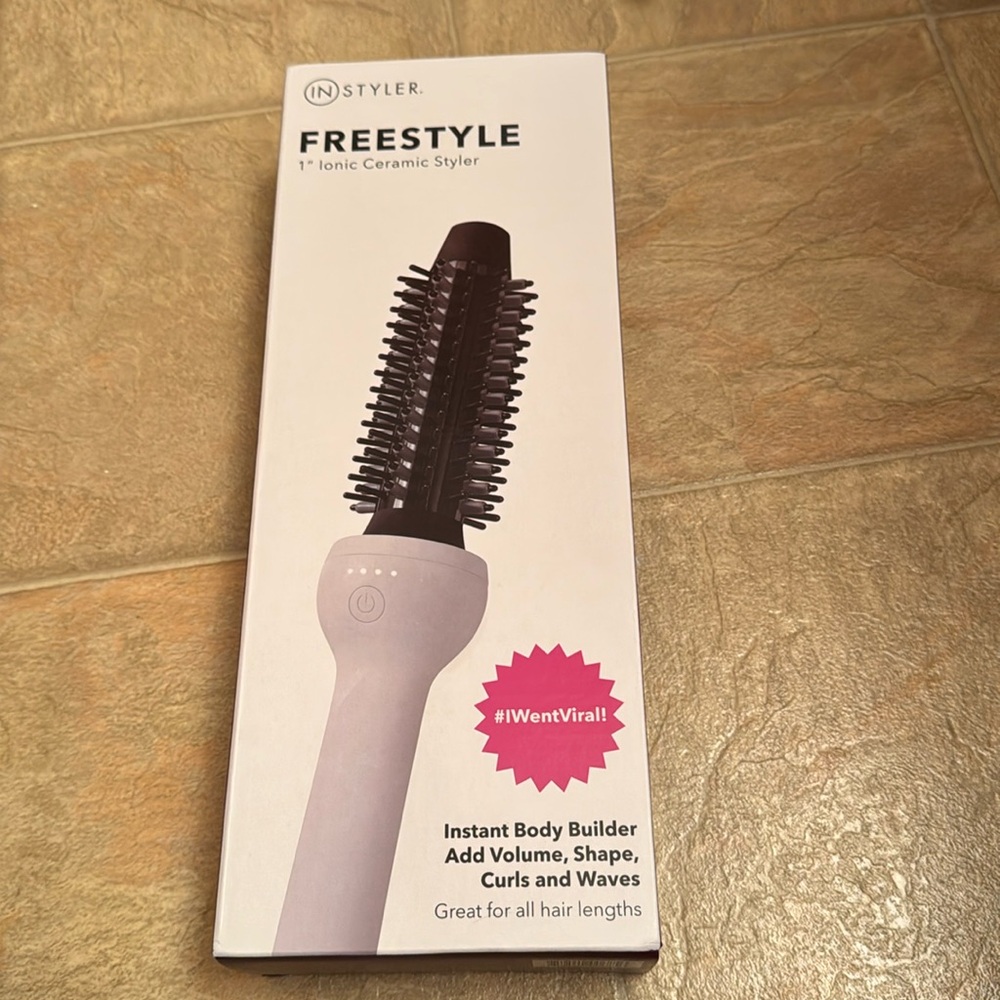Never opened new inbox Instyler. 
Freestyle 1 inch ceramic styler.